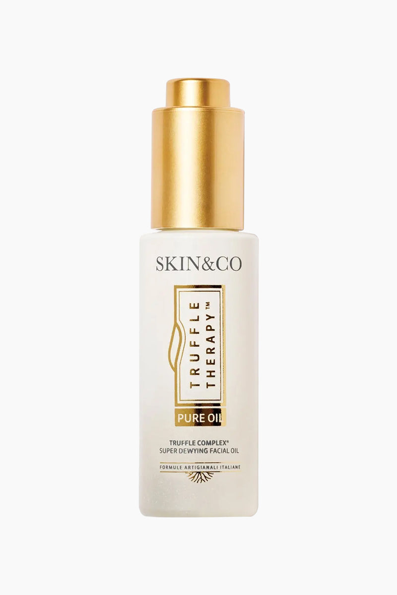 SKIN&CO Roma Truffle Therapy Pure Oil in a frosted glass bottle with gold cap, ideal for hydrating and revitalizing facial skin in skincare routines.